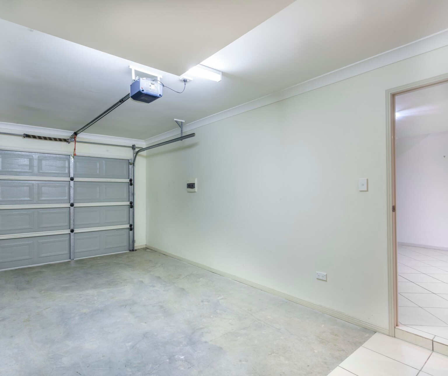 Rural outbuilding at dusk, hinting at mechanical wear and aging structures.